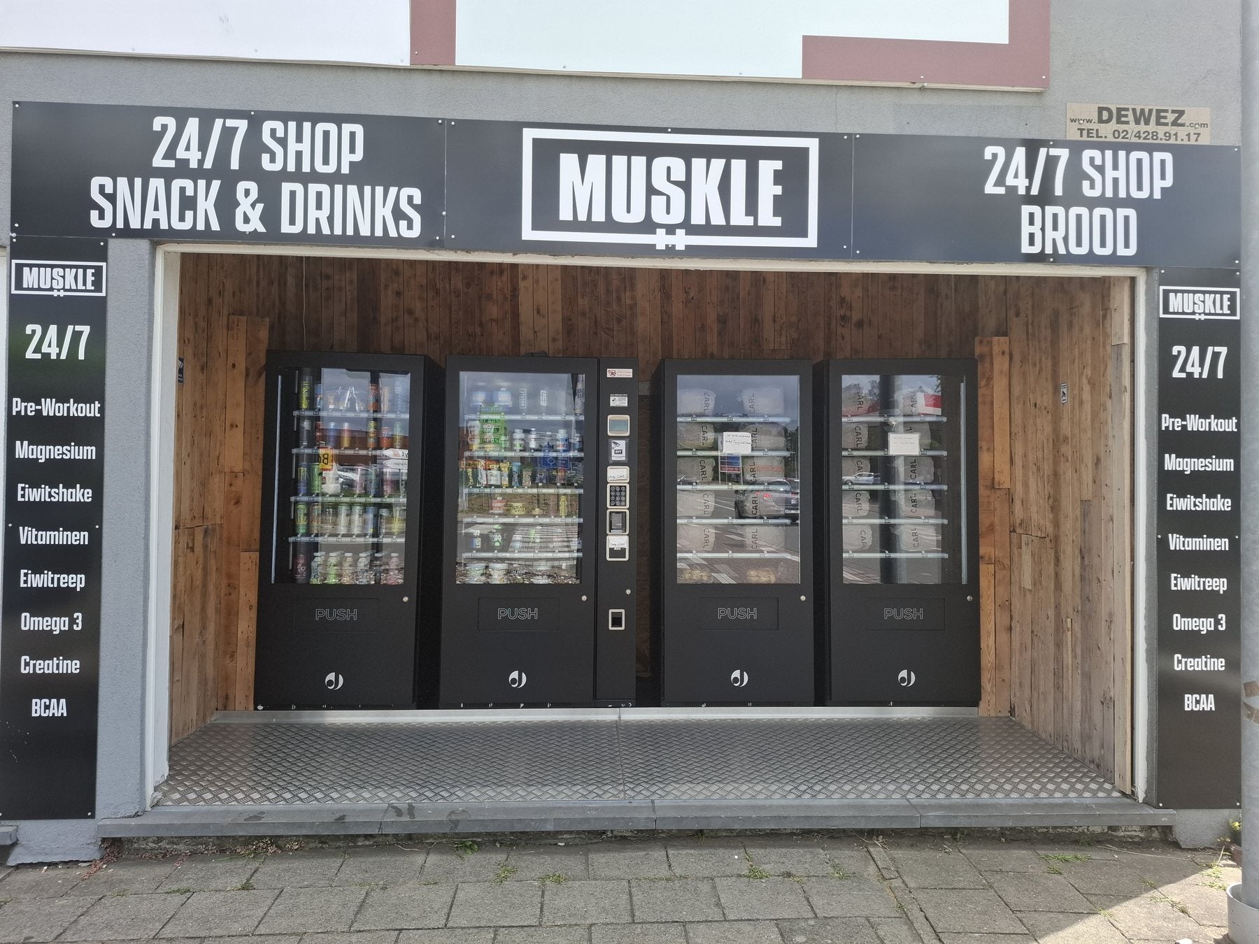 MUSKLE 24/7 snack- en drankautomaten naast de winkel in Bonheiden